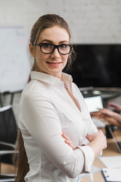 Businesswoman posing during a meeting