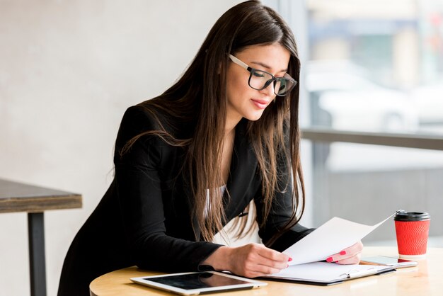 Businesswoman reading document