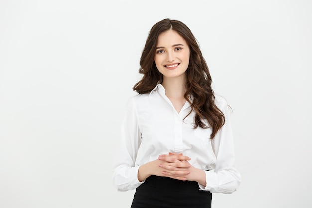 Businesswoman rubbing or holding hands isolated over white background