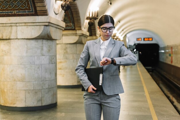 Businesswoman in subway station