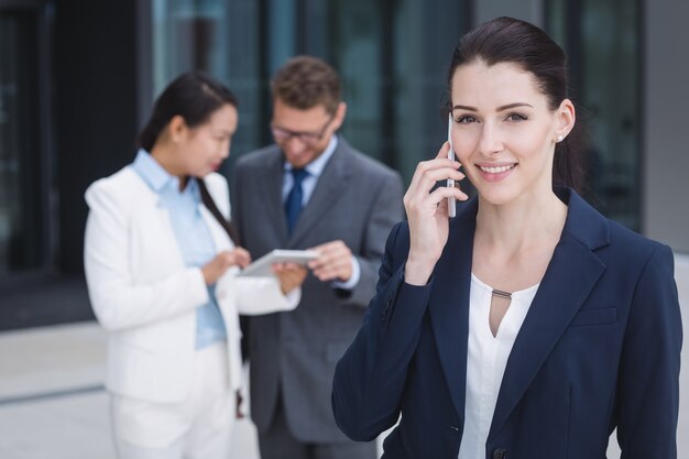 Businesswoman talking on mobile phone