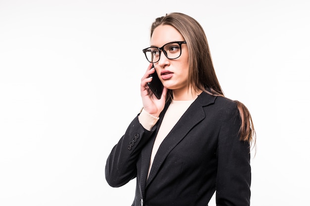 Businesswoman talks with mobile phone isolated on white