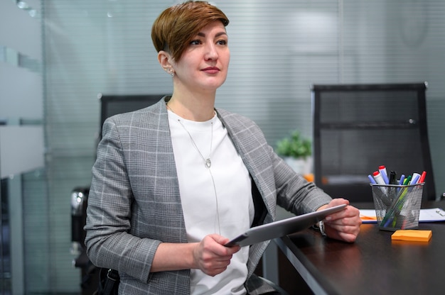 Businesswoman in wheelchair with short hair