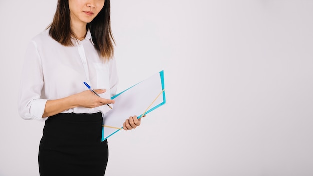 Businesswoman with clipboard