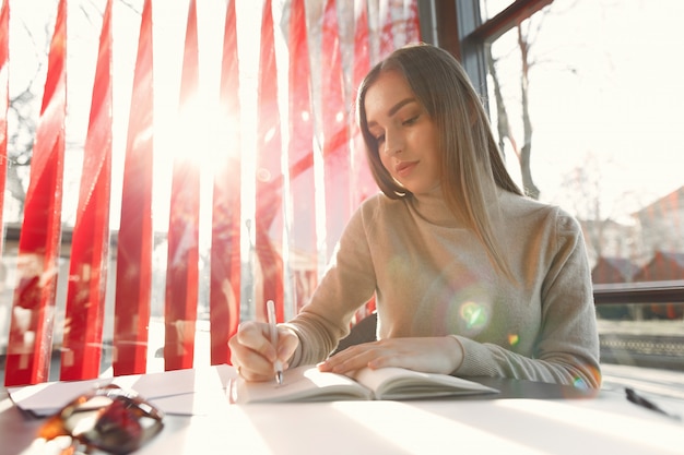 Free Photo businesswoman working in a cafe