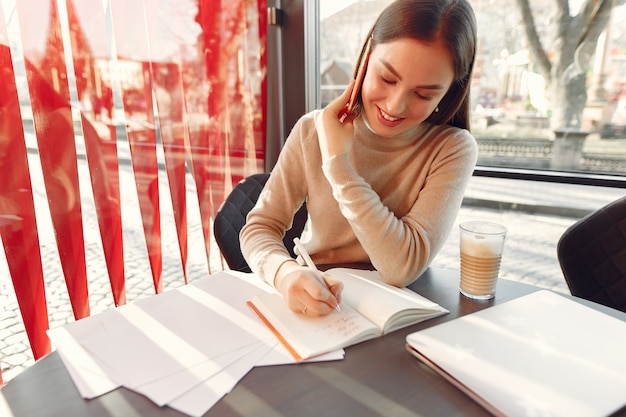 Free Photo businesswoman working in a cafe