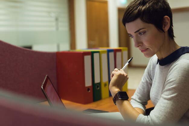 Businesswoman working at her desk