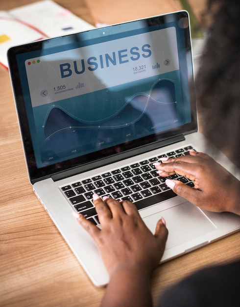 Free Photo businesswoman working on a laptop