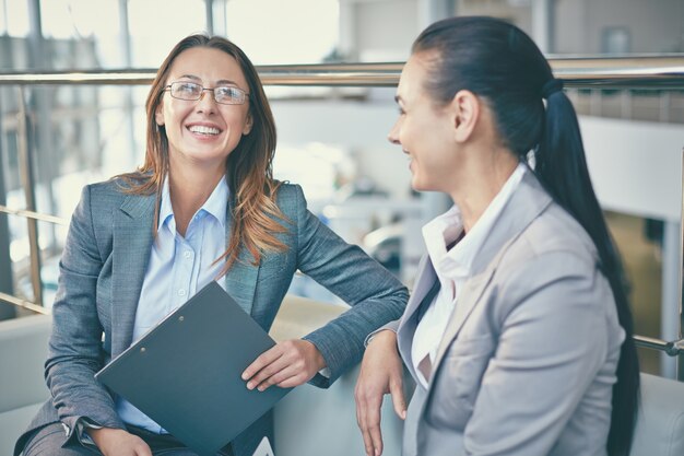 Businesswomen having a good time at the office