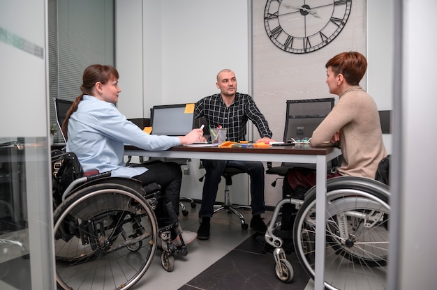 Businesswomen in wheelchair long view