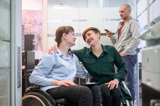 Businesswomen in wheelchair at the office