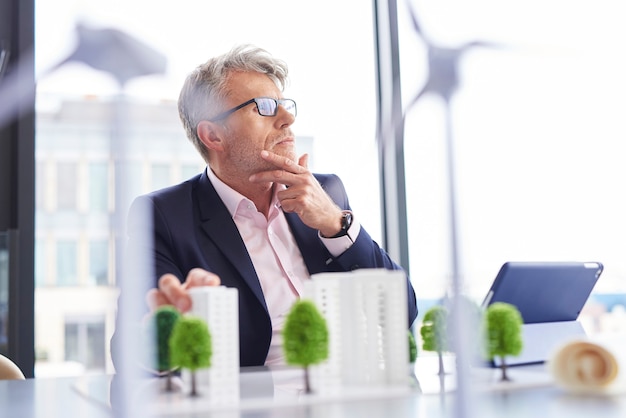 Free Photo busy businessman thinking about new solutions