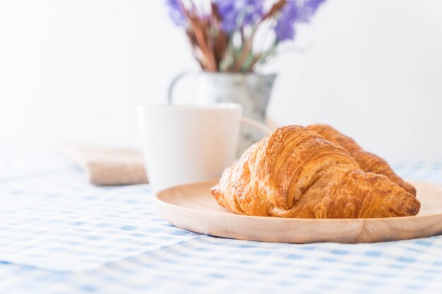 butter croissant on table