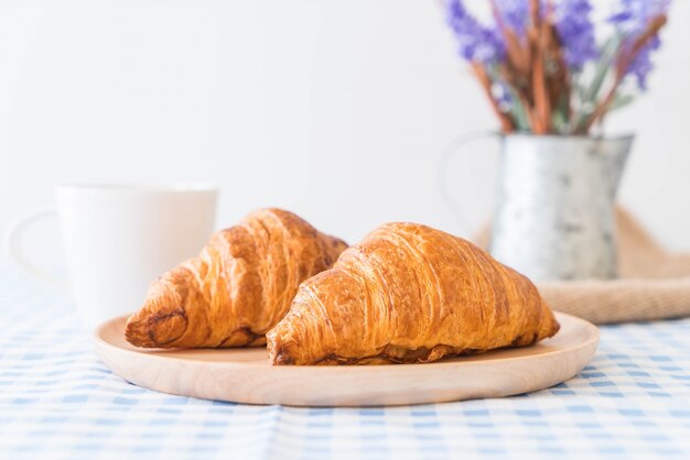 butter croissant on table