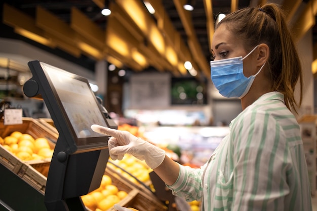 Buying food at supermarket during corona virus global pandemic