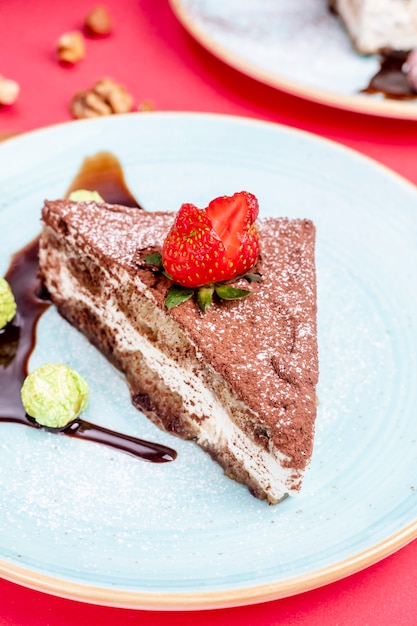 Cacao cake topped with strawberry