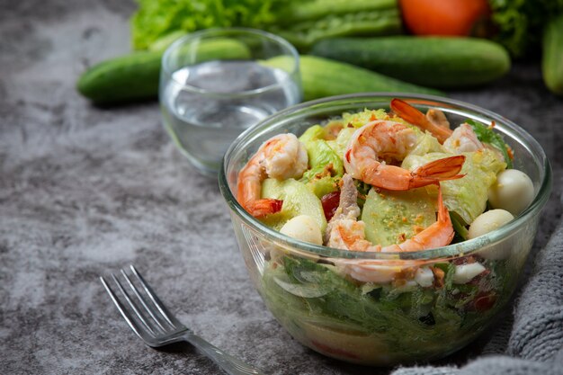 Caesar prawn salad with delicious shrimp Healthy food concept.