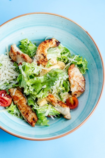 Caesar salad with fried chicken _