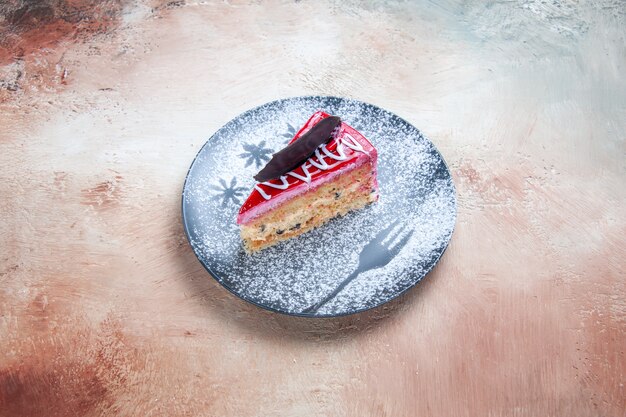 cake an appetizing cake with powdered sugar on the plate