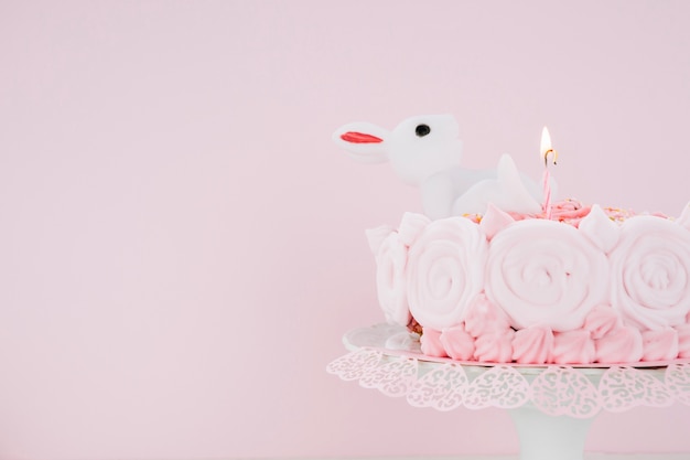 Cake decorated with rabbit and candle