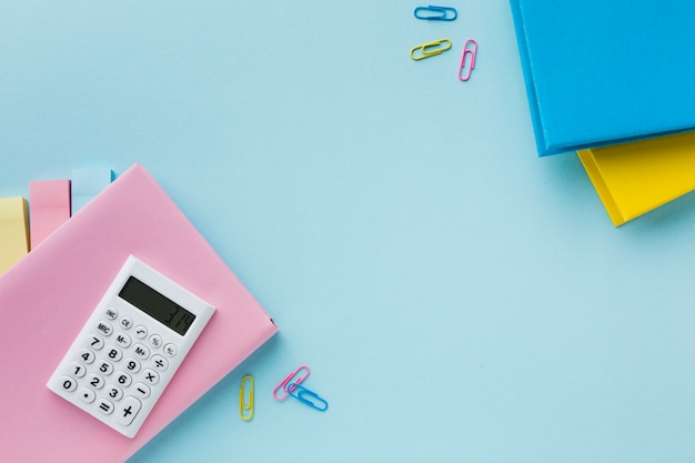 Calculator and colorful paper clips