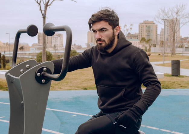 A calisthenics instructor doing his routine training