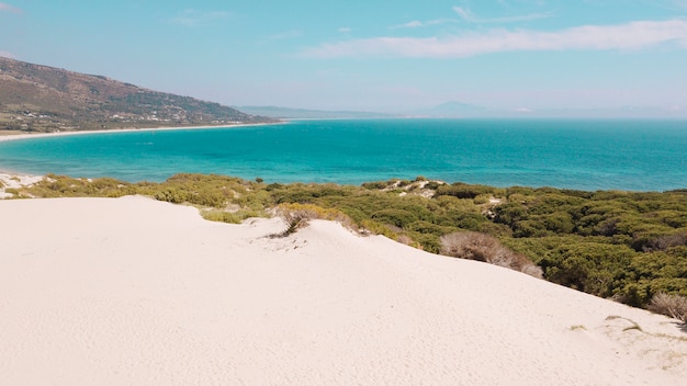 Calm turquoise sea and deserted beach