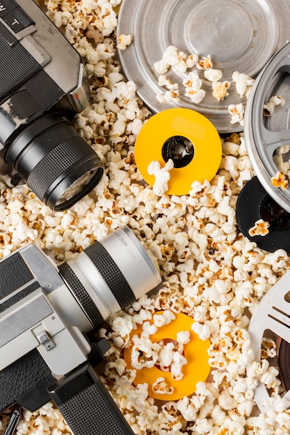 Free Photo camcorder camera with film reels on popcorn