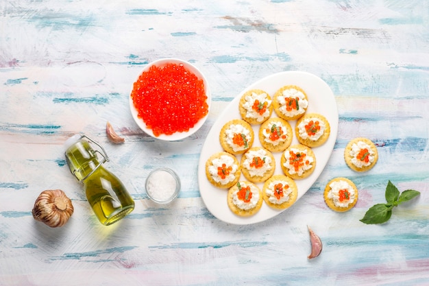 Free Photo canape with red caviar for party.