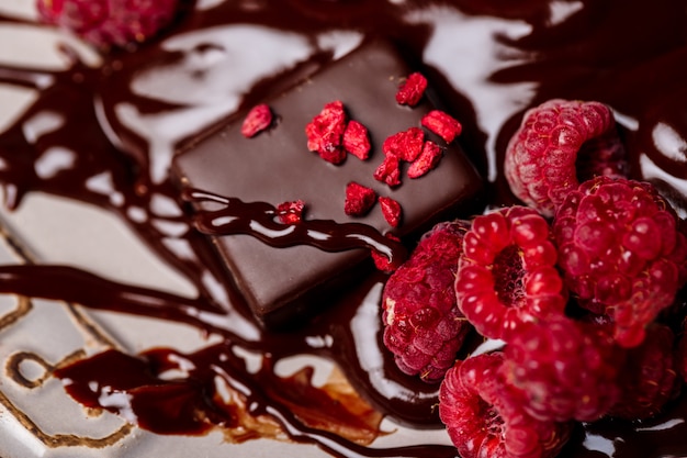 Candies and raspberry in hot chocolate.