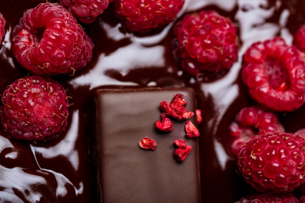 Candies and raspberry in hot chocolate.