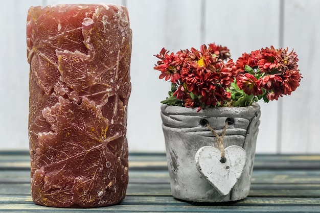 candle with flowers in pot  heart