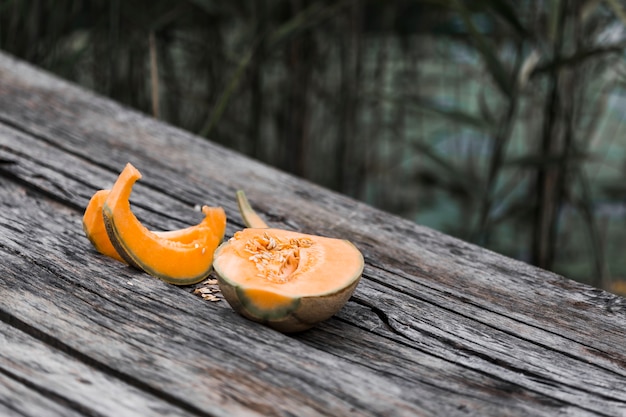 Cantaloupe melon on wooden table