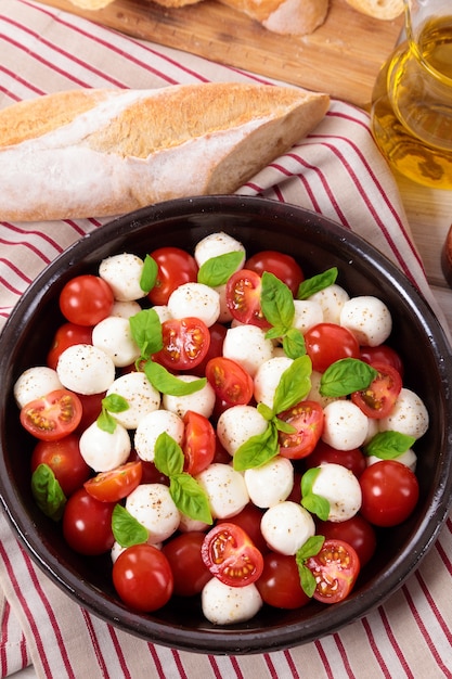 Free Photo caprese salad with mozzarella cheese and basil