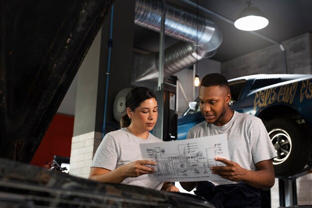 Car being taking care of in workshop