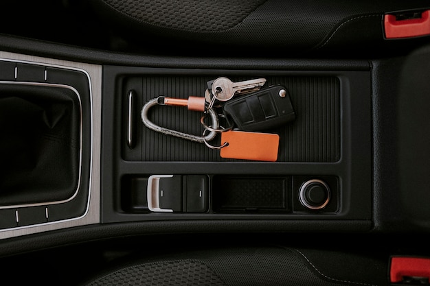 Free Photo car key in a center console space