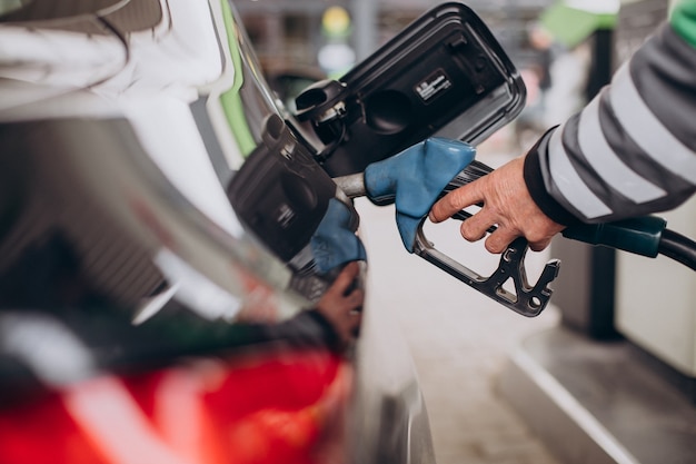 Car refueling at fuel station