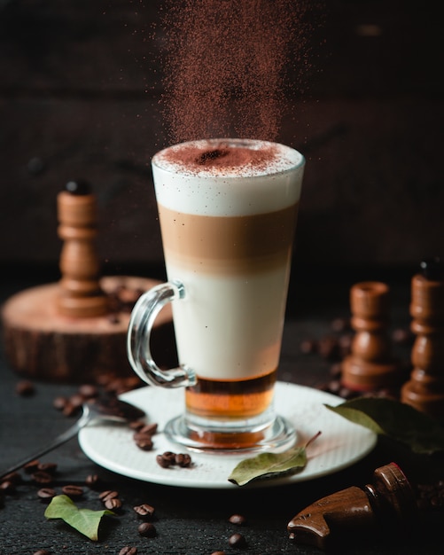 caramel latte with chocolade on the table