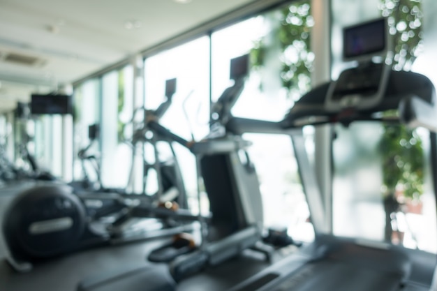 Cardio machines in a gym blurry