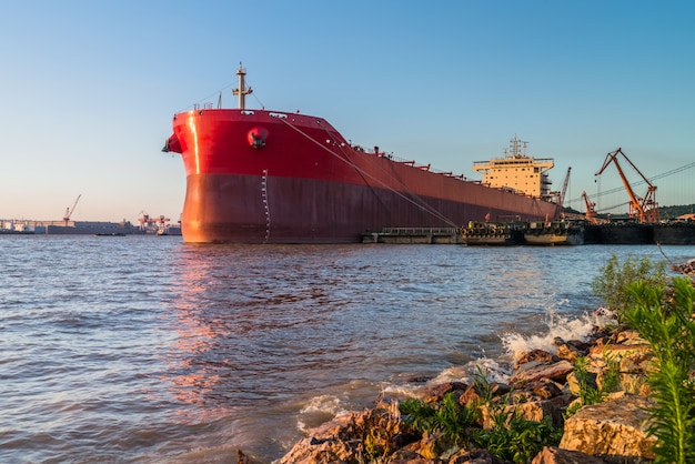 Free Photo cargo container ship at harbor