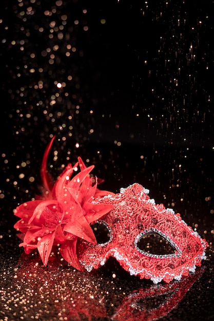 Carnival mask with glitter and copy space