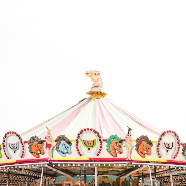 Free Photo carousel roof decoration against white background