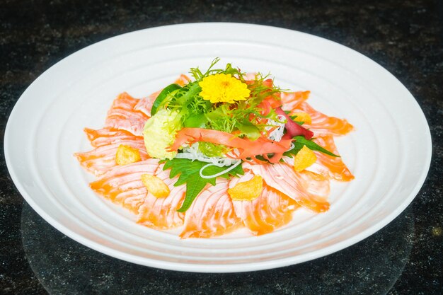 Carpaccio salmon in white plate