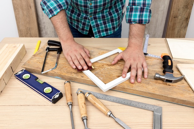 Carpenter working on wood in his workshop