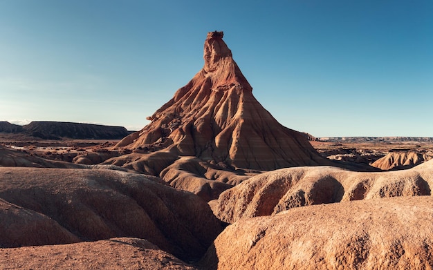 Free Photo castil de terra. panoramic view of the bardenas reales, navarra, spain. unique sandstone formations eroded by wind and water