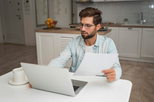 Casual adult male working from home