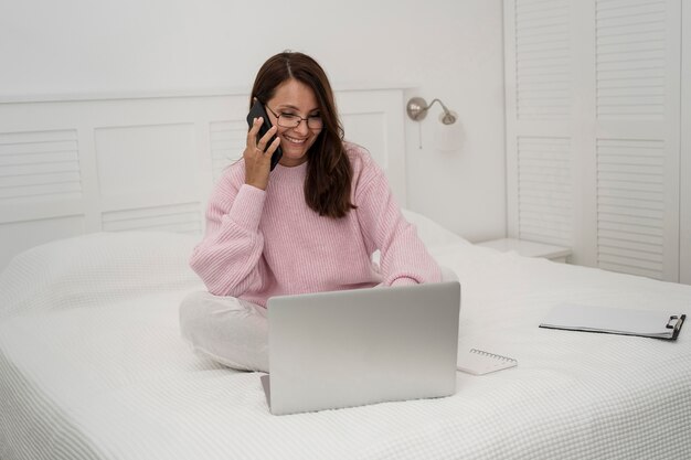 Casual adult woman working at home