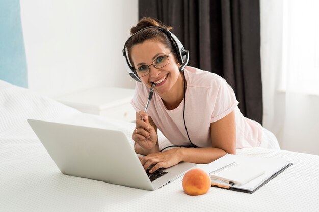 Casual adult woman working at home