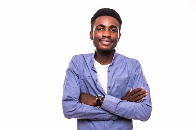 Casual young african man posing on white wall