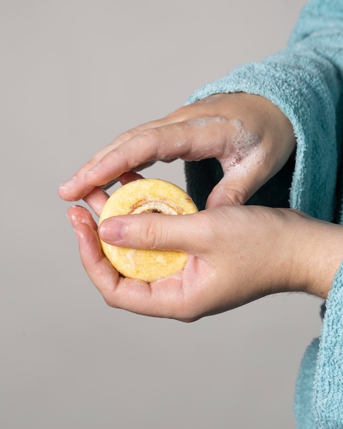 Caucasian person washing hands with soap